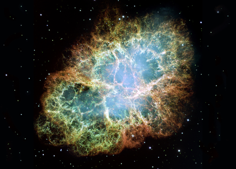 When stars “die,” they leave one of two objects behind. Massive stars explode as supernovae, creating remnants of gas and dust like the Crab Nebula (M1). Credit: ASA, ESA, J. Hester and A. Loll (Arizona State University)